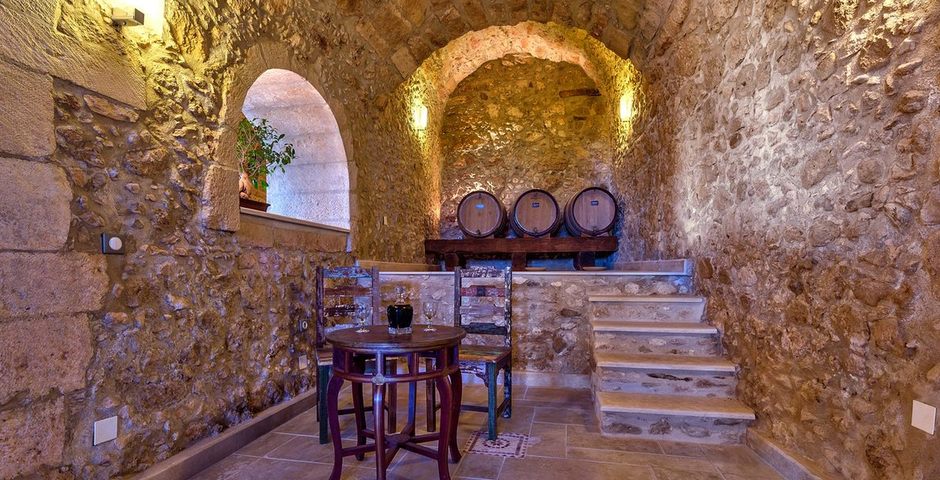Show luxury traditional villa old mill mouranas crete greece wine cellar